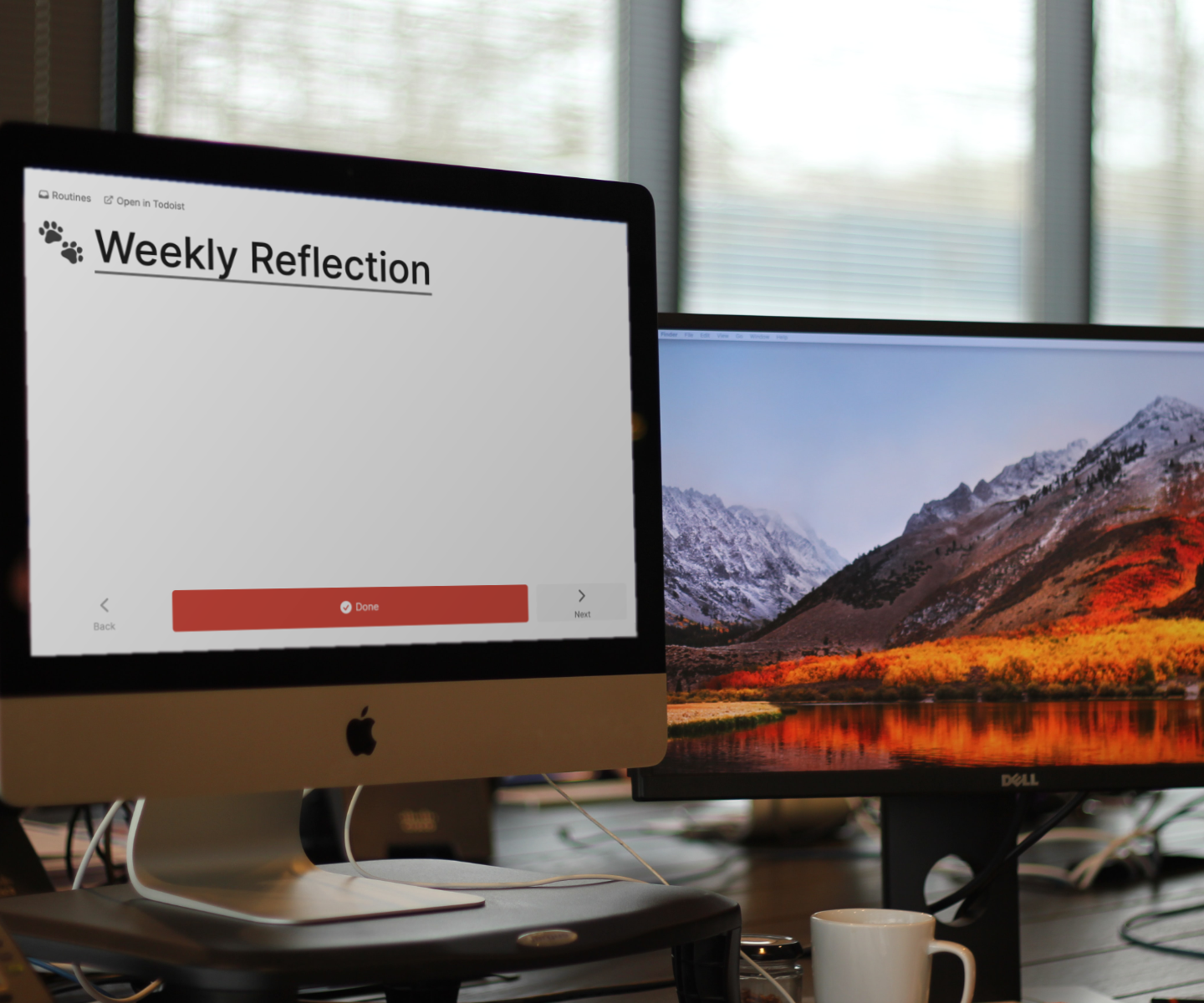 two screens, the one to the left running Flowist with a task called Weekly Reflection